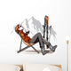 Woman having a break drinking coffee after skiing Wall Decal