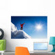 Mountaineer celebrates the conquest of the summit. Wall Decal
