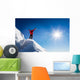 Mountaineer celebrates the conquest of the summit. Wall Decal
