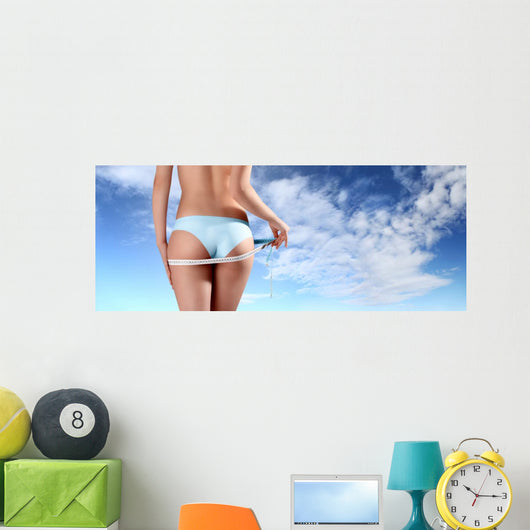 woman with tape meter on buttocks Wall Decal