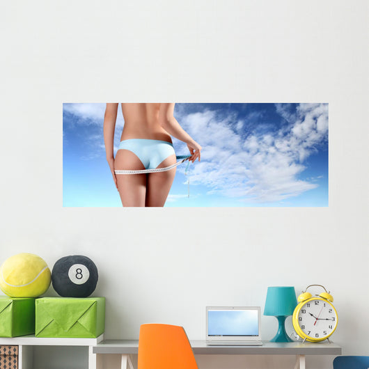 woman with tape meter on buttocks Wall Decal