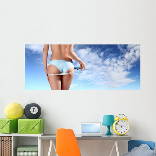 woman with tape meter on buttocks Wall Decal