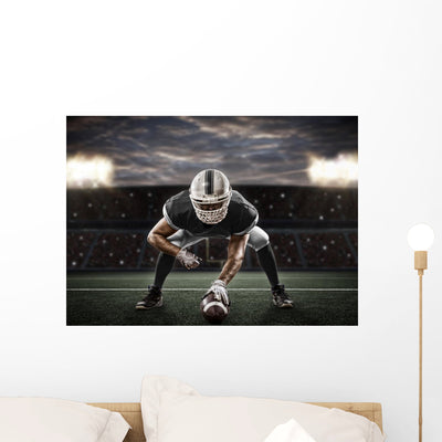 Football Player Wall Decal 2 shown on a wall