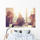 Young group of people/architects discussing business plans. Wall Decal