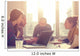 Young group of people/architects discussing business plans. Wall Decal