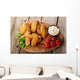 Fried chicken wings with sauce and tomatoes Wall Decal