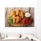 Fried chicken wings with sauce and tomatoes Wall Decal