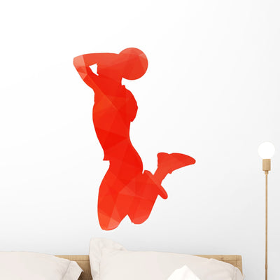 Orange Abstract Basketball Player Wall Decal shown on a wall