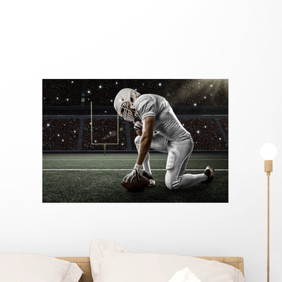 Football Player Wall Decal shown on a wall