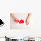 Close-up of child hands drawing a red heart Wall Decal
