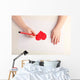 Close-up of child hands drawing a red heart Wall Decal