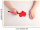 Close-up of child hands drawing a red heart Wall Decal