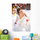 Happy Laughing Bride Sitting Outdoors on the Floor with Petals Wall Decal