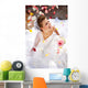 Happy Laughing Bride Sitting Outdoors on the Floor with Petals Wall Decal