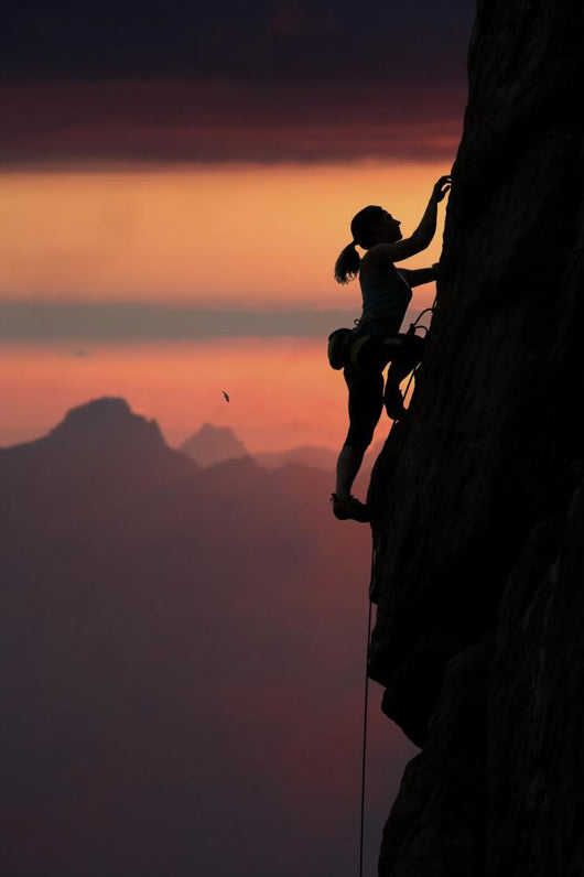 Elegant Female Alpine Climber