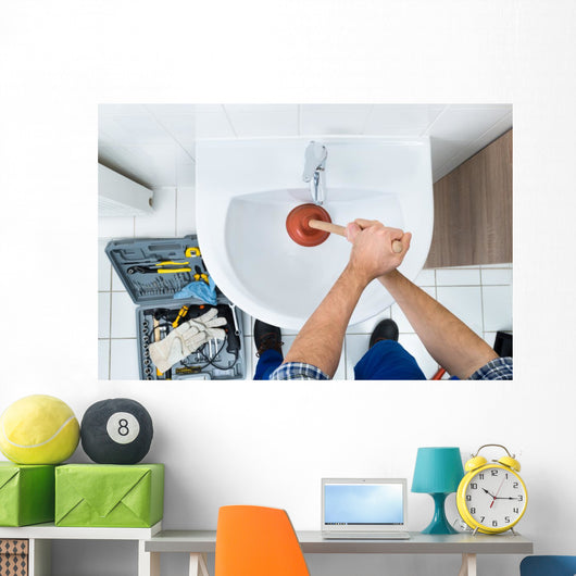 Male Plumber Using Plunger In Bathroom Sink Wall Decal