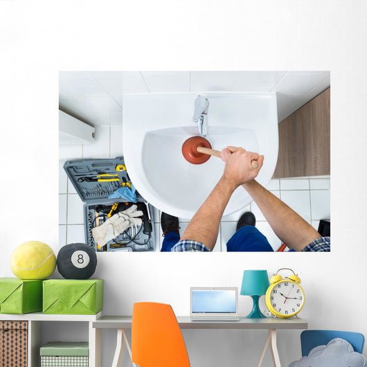 Male Plumber Using Plunger In Bathroom Sink Wall Decal