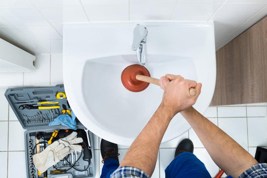 Male Plumber Using Plunger In Bathroom Sink Wall Decal