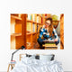 Woman student in college library Wall Decal