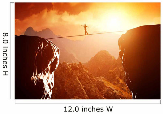 Man walking and balancing on rope over precipice in mountains Wall Decal