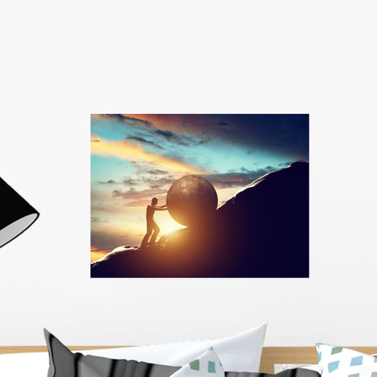 Sisyphus metaphor. Man rolling huge concrete ball up hill. Wall Decal