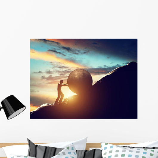 Sisyphus metaphor. Man rolling huge concrete ball up hill. Wall Decal