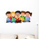 Happy children sitting on the floor while reading books Wall Decal