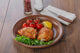 baked chicken thigh with cherry tomatoes and lemon Wall Decal