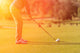 Golf player tee off at sunset Wall Decal