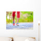 Jogging woman with athletic legs and running shoes Wall Decal