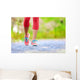 Jogging woman with athletic legs and running shoes Wall Decal