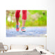 Jogging woman with athletic legs and running shoes Wall Decal