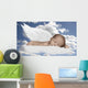 baby infant in clouds with wings Wall Decal