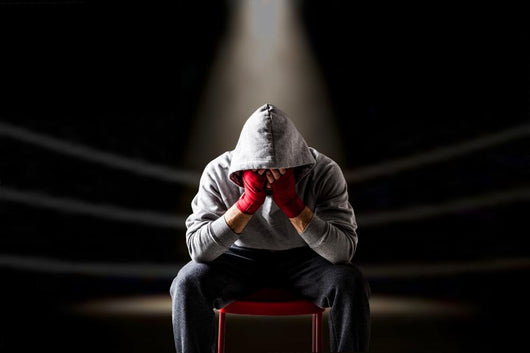 Defeated boxer seating on the ring Wall Decal