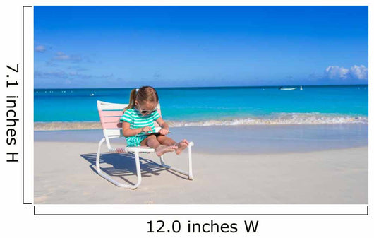 Little girl with laptop on beach during summer vacation Wall Decal