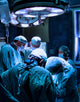A medical team performing an operation Wall Decal