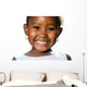 Extreme close up of small african girl showing teeth.T Wall Decal