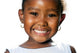 Extreme close up of small african girl showing teeth.T Wall Decal