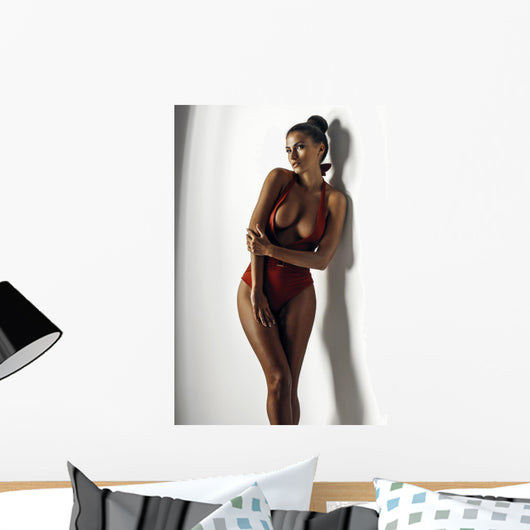 Girl in a red bathing suit Wall Decal