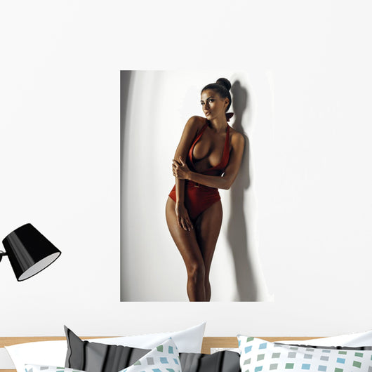 Girl in a red bathing suit Wall Decal