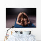 Mature woman practicing yoga on the floor Wall Decal