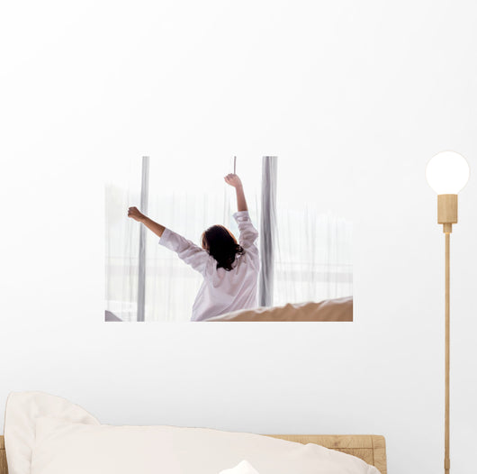 Young asian woman stretching in the morning Wall Decal