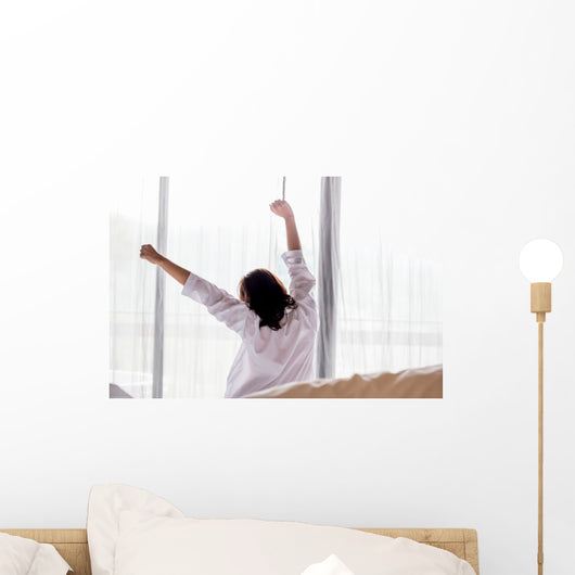 Young asian woman stretching in the morning Wall Decal
