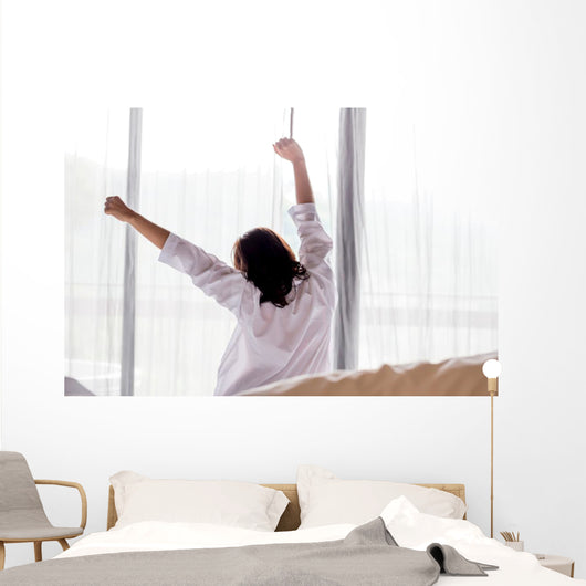Young asian woman stretching in the morning Wall Decal