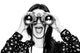 Surprised girl looking through binoculars black and white Wall Decal