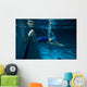Female swimmer at the swimming pool.Underwater photo. Wall Decal