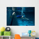 Female swimmer at the swimming pool.Underwater photo. Wall Decal