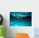 Female swimmer at the swimming pool.Underwater photo. Wall Decal