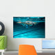 Female swimmer at the swimming pool.Underwater photo. Wall Decal