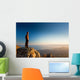 man on the cliff in mountains at sunset Wall Decal